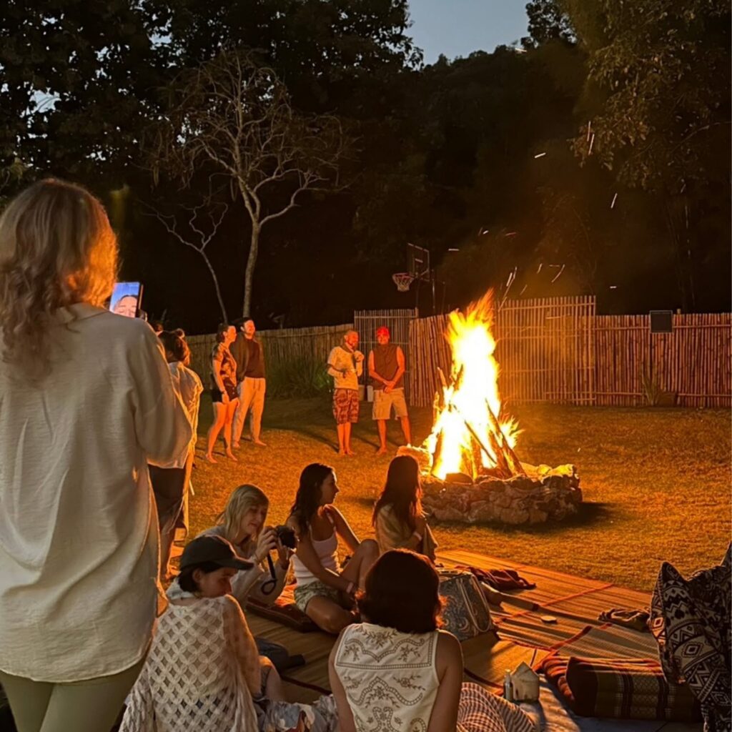 Guests gathered around the bonfire at Eudemonia Organic Nights